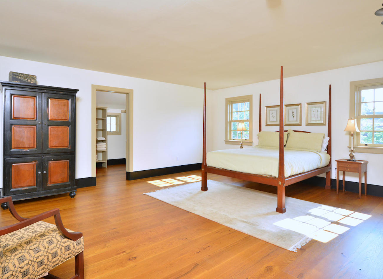 Large bedroom with bathroom attached in an olde bulltown home