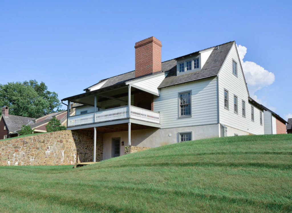 Rear elevation of an olde bulltown home with white siding