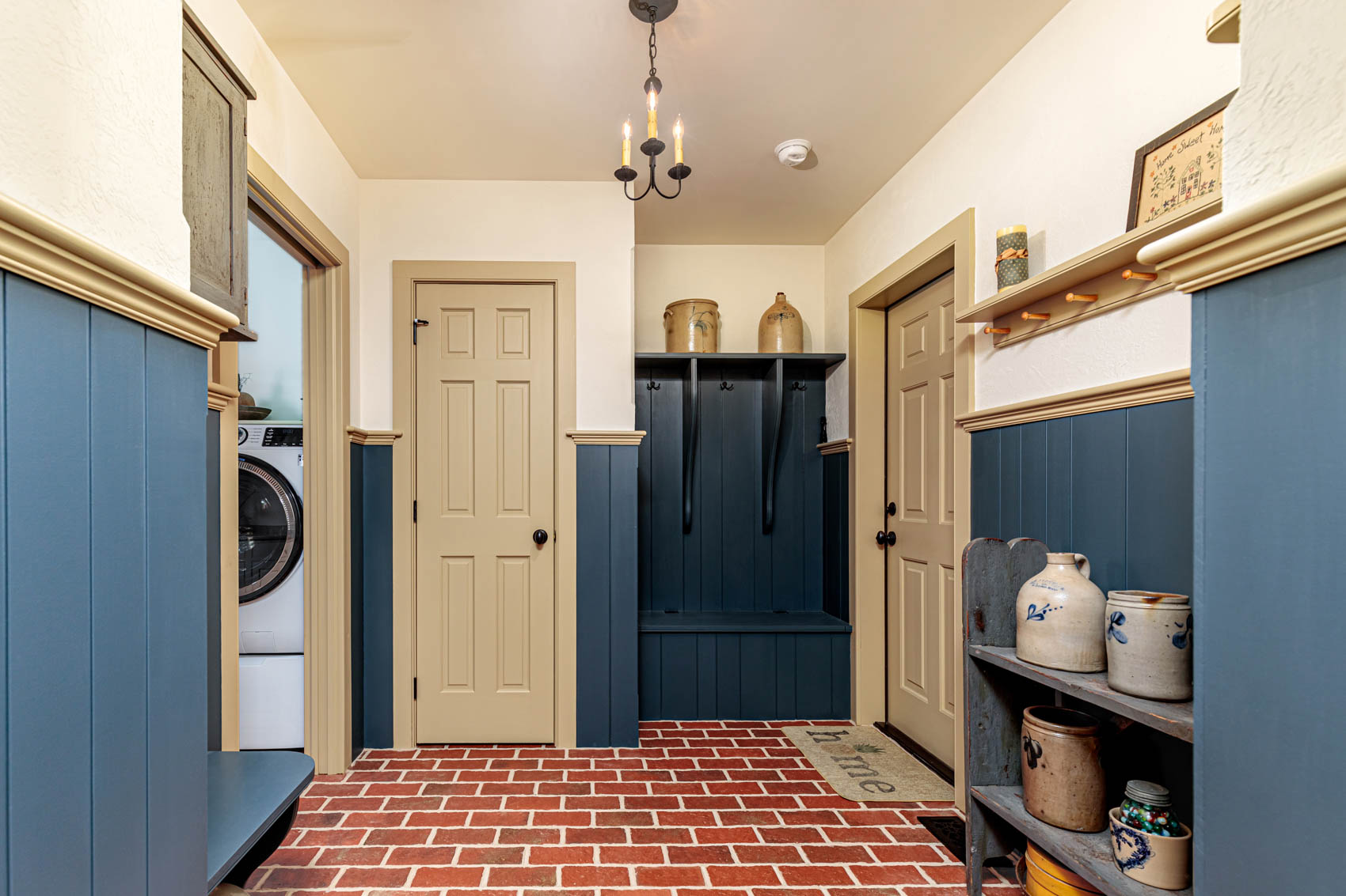 Mudroom with blue walls in an olde bulltown home
