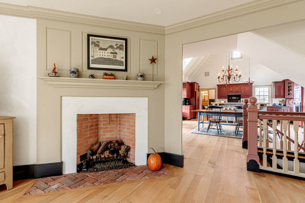 Living room with fireplace in an olde bulltown home