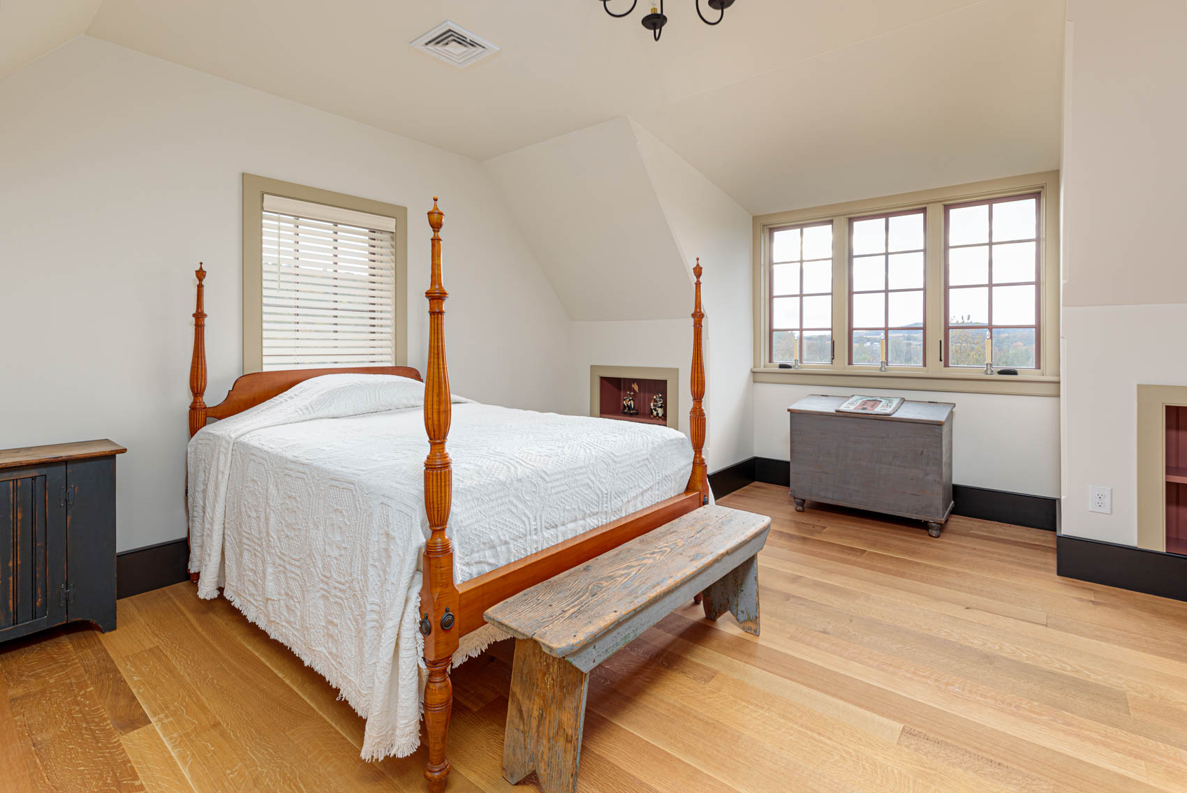 Large bedroom with king bed in an olde bulltown home