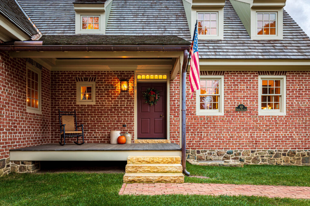 Front porch of a brick house in olde bulltown