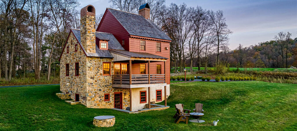 Rear elevation of a red home in olde bulltown