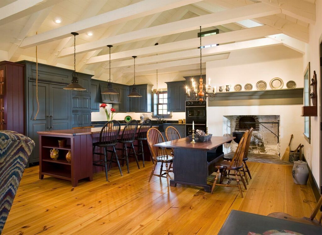 Large kitchen with black cabinets and center island in an olde bulltown home